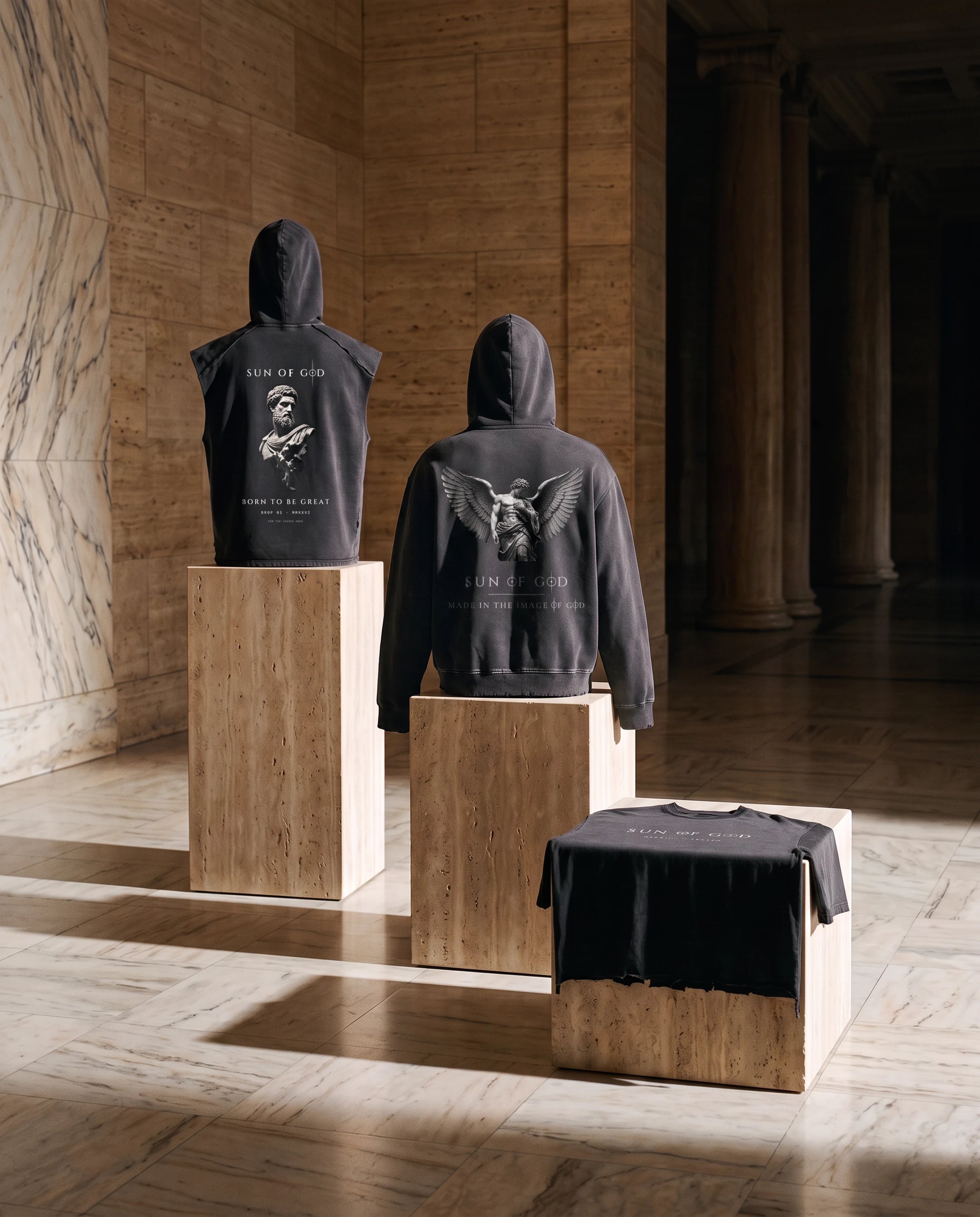 OCULUS garments displayed on stone plinths